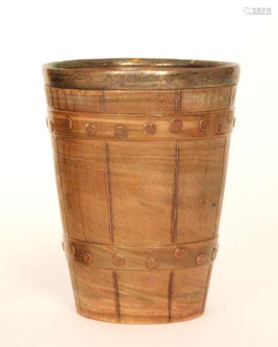 A late 19th Century Doulton Lambeth silver collared beaker formed as a coopered barrel with faux wooden grain detailing and two bands of rivets