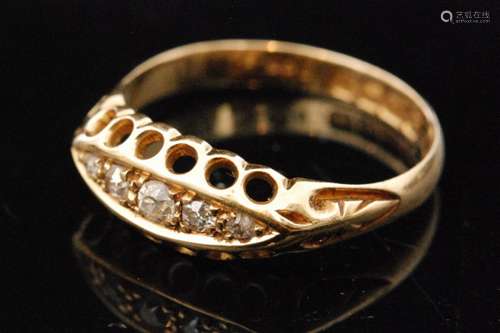 An early 20th Century 18ct boat shaped diamond five stone ring