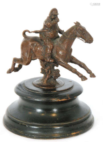 After Snaffles - A cast bronze figure of a huntsman on horseback blowing a horn on ebonised base