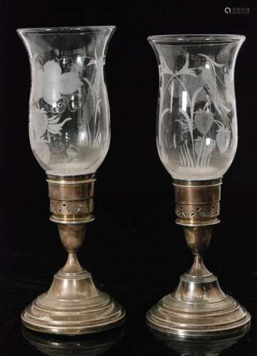 A pair of hallmarked silver and glass night lights