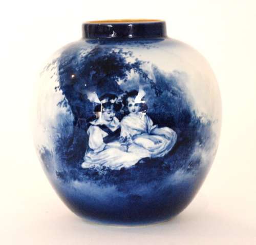 An early 20th Century Royal Doulton 'Blue Children' vase of ovoid form decorated with two girls sat under a tree