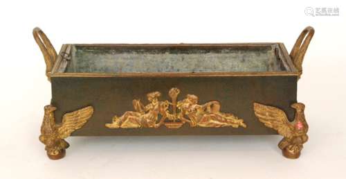 A French Empire period Palais Royal rectangular twin handled trough with applied gilt metal decoration and raised on phoenix capped scroll feet