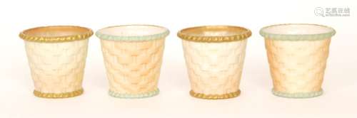 Four early 20th Century Royal Worcester cache pots each with basket weave moulded decoration in blush ivory