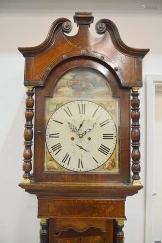 A 19th Century oak and mahogany crossbanded longcase clock with an eight day movement striking on a bell