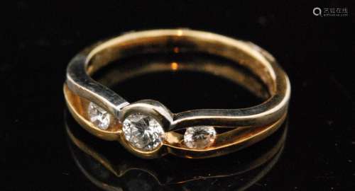 An 18ct hallmarked diamond three stone ring