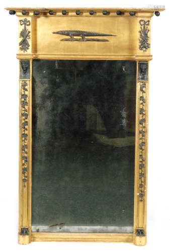 A 19th Century French Empire period Egyptian revival wall mirror