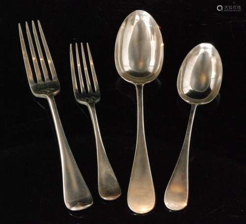 A composed part canteen of hallmarked silver old English pattern flatware comprising twelve dinner and desert forks with twelve serving and dessert spoons