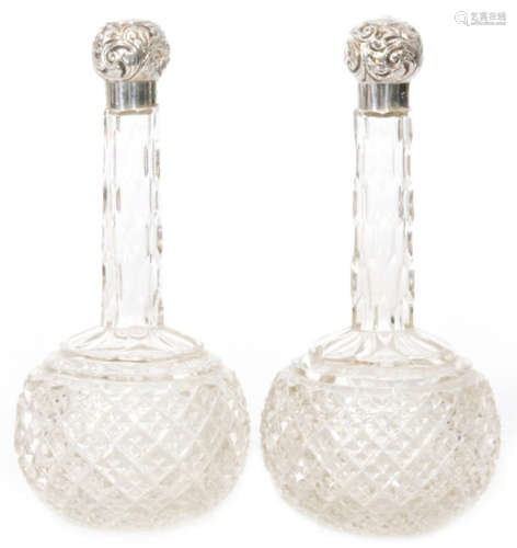 A pair of hallmarked silver and glass mallet scent bottles