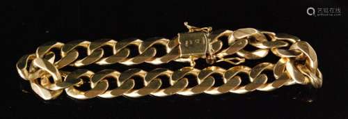 A 9ct hallmarked gentleman's filled curb link bracelet terminating in tongue and box fastener