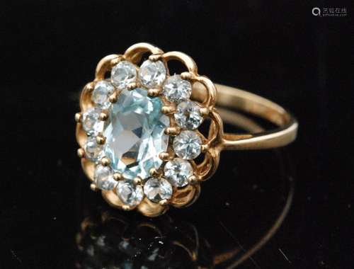 A modern 9ct hallmarked blue topaz cluster ring