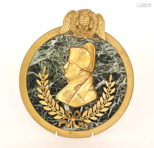 A 19th Century French Empire marble and ormolu mounted circular plaque