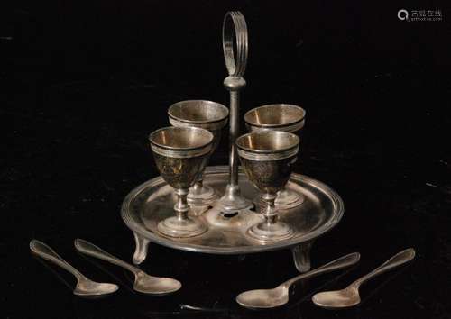 A hallmarked silver egg cruet for four eggs