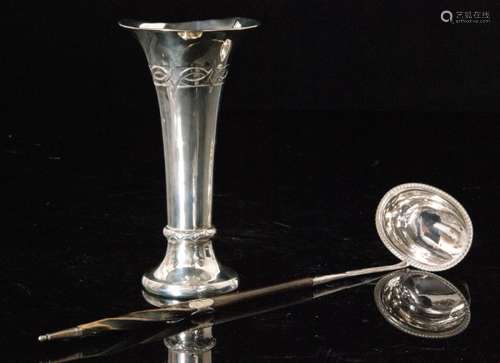 An Art and Crafts trumpet vase with diamond detail to foot collar and conforming decoration below border