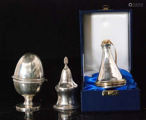 A modern cased hallmarked silver compendium of conical from opening to a gilt thimble