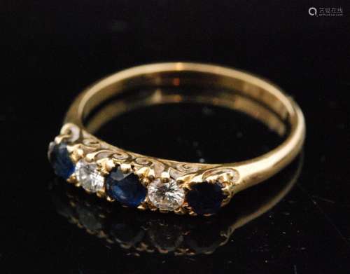 An early 20th Century 18ct sapphire and diamond five stone ring