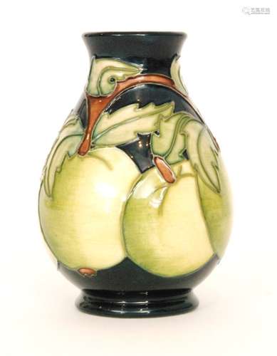 A Moorcroft Pottery baluster vase decorated in the Apples pattern