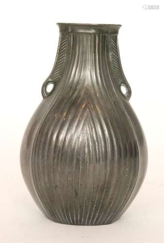 An Art Deco pewter vase of slender ribbed form stamped to the base Just Denmark D2011