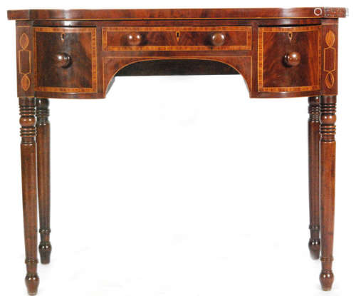 A late Georgian mahogany break-fronted buffet sideboard