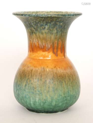 A Ruskin Pottery vase of globe and shaft form decorated in a streaked crystalline glaze with green to orange to green