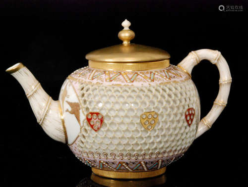 A late 19th Century Royal Worcester Aesthetic reticulated teapot and cover in the manner of George Owen