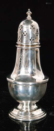 A hallmarked silver sugar castor of plain baluster shape terminating in pierced cover