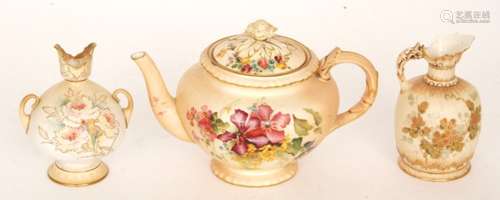 An early 20th Century Royal Worcester blush ivory teapot decorated with sprays of flowers and foliage