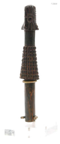 A carved Polynesian tip staff with chip cut stylised head detail