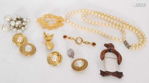 A small parcel lot of costume jewellery to include two pairs of gilt metal Chanel clip earrings