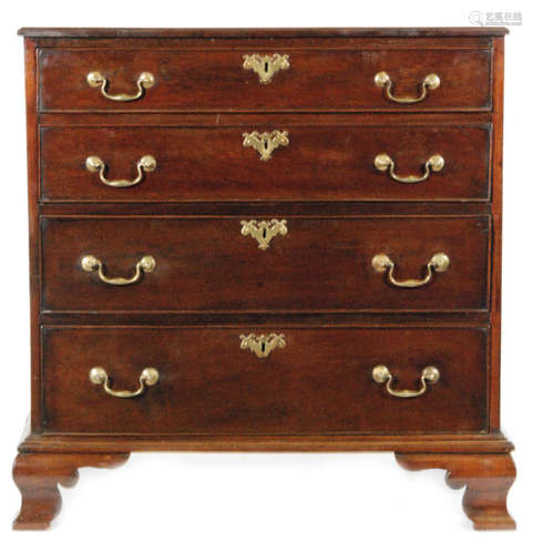 A George III mahogany straight front chest of four long graduated drawers