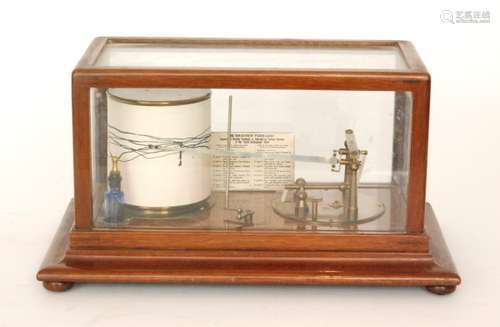 A 1920s barograph in glazed mahogany case with fixed silvered weather forecast chart on a stepped base