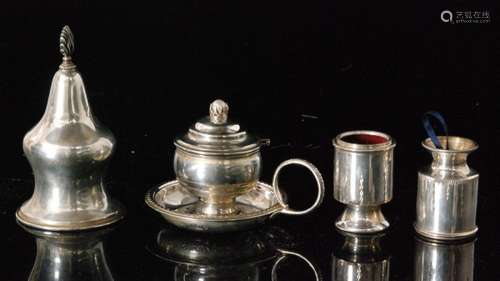 Four modern hallmarked silver items a small chamber stick and pair of squat cylindrical candlesticks and a table lighter