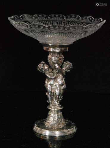 A 19th Century silver plated table centre piece modelled as a two cherubs holding a central urn standing in a circular pedestal base