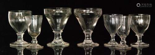 A group of early 19th Century glass rummers comprising a pair each conical bowl and capstan stem