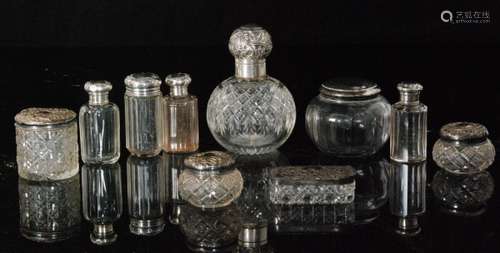 Ten assorted hallmarked silver and clear cut glass dressing table and scent bottles to included a globular scent