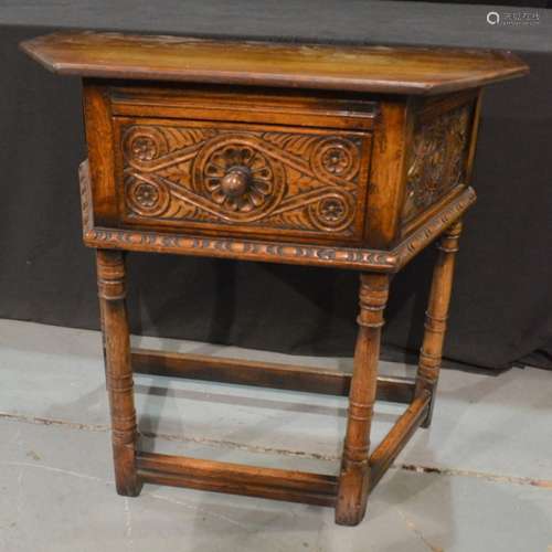 An oak credence table in the 17th Century style