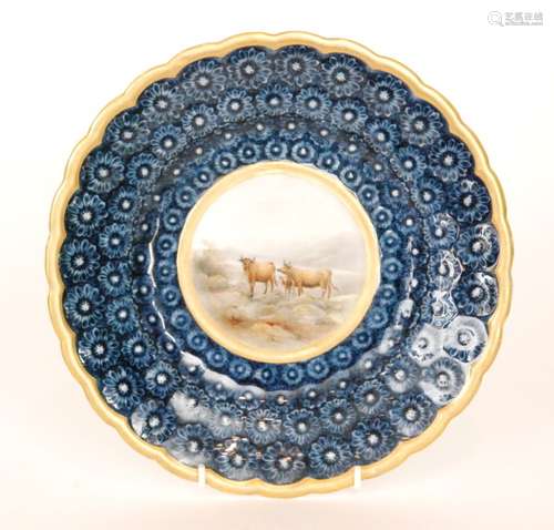 A Graingers & Co Royal China Works cabinet plate decorated to the central roundel with Highland cattle in a mountainous setting