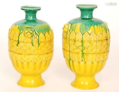 A pair of 19th Century Chinese pottery vases of shouldered ovoid form with collar neck