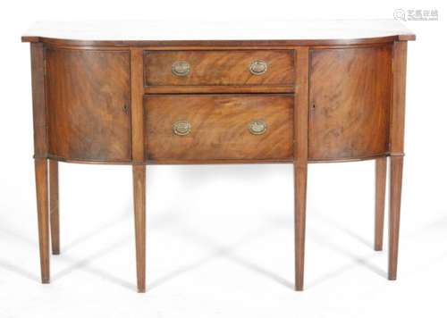 A small  late 19th Century mahogany bowfront sideboard with two central drawers flanked by two cupboards on square moulded legs