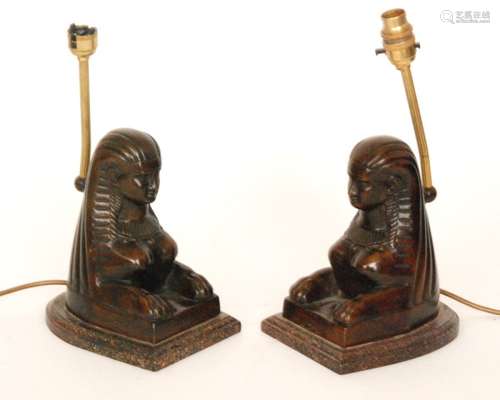 A pair of bronze table lamps