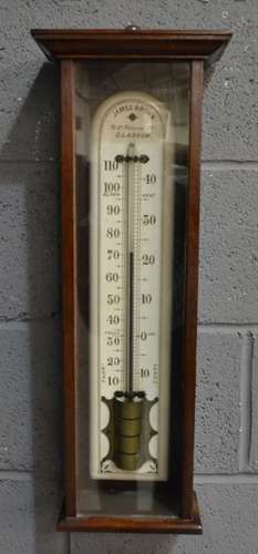 A late 19th Century wall mounted mahogany cased barometer