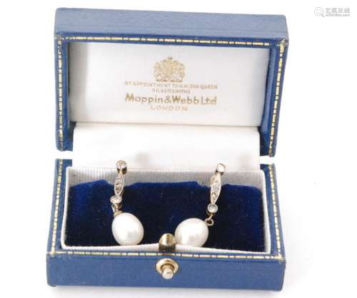 A pair of diamond and pearl pendant earrings