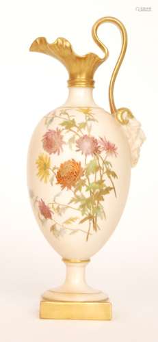 A late 19th Century Royal Worcester shape 1144 pedestal ewer decorated with a spray of gilt and enamel flowers against a blush ivory ground