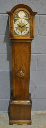 A 1930s oak Grandmother clock with eight day striking movement