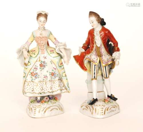 A pair of early 20th Century Naples porcelain figurines depicting a lady and gentleman in Regency dress