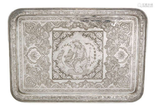 A Persian silver rectangular tray engraved with a central kneeling female figure with a heron in attendance all within foliate engraved decoration and rope twist borders