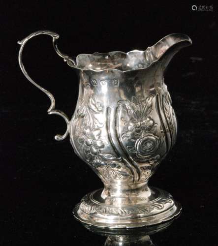 A George III hallmarked silver cream jug