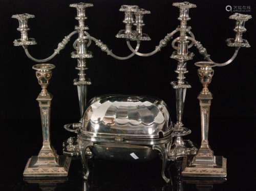 A pair of silver plated three branch candelabrum