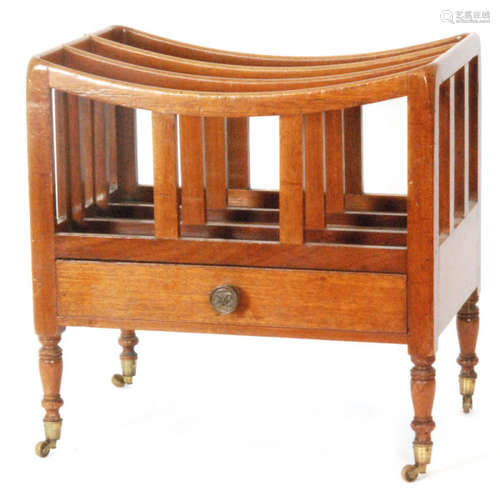 A 19th Century mahogany Canterbury of plain section with divisional sections above a single frieze drawer