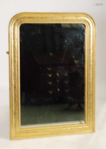 A late 19th Century gilt framed overmantle mirror of arched form