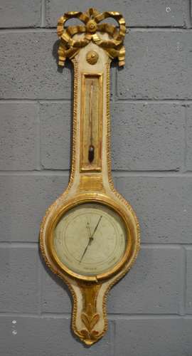 A 19th Century French wheel barometer with carved frame with gesso